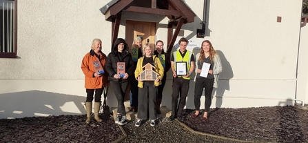 Winncare staff after wildflower seed planting